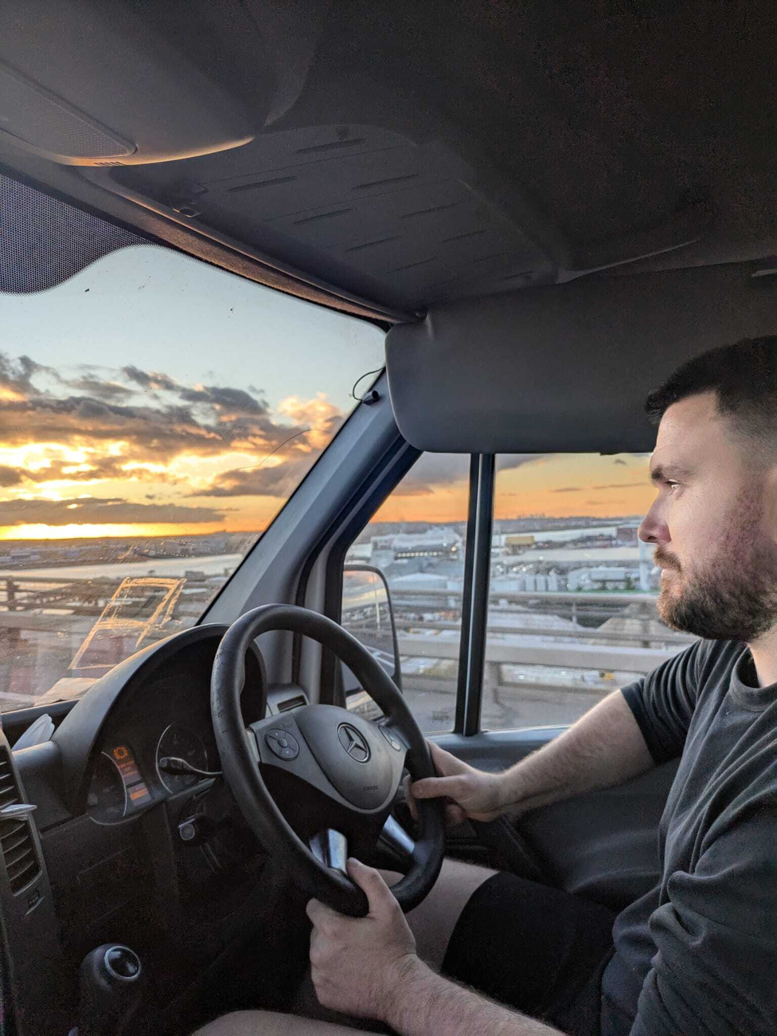 Peter driving the ESV Removals van across the Dartford Crossing at sunset, heading into Kent after a North London move